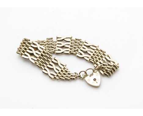 A 1970s 9ct gold gate link bracelet, with heart shaped padlock clasp, 19.5g 
