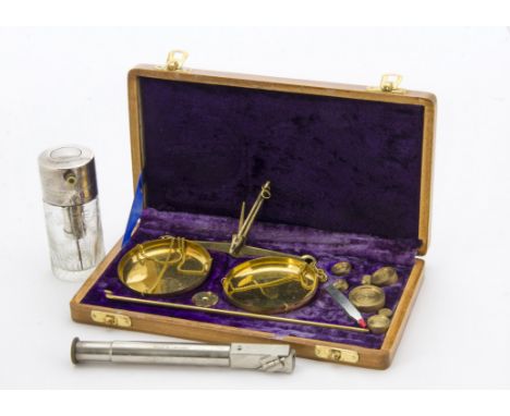 An early 20th century silver and cut glass from Mappin &amp; Webb, together with a cased set of jeweller's scales and an alco