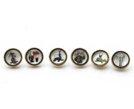 A set of six vintage Guinness buttons, each with differing theme, stamped Guinness to brass backing (6) 