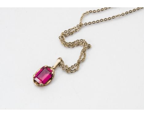 A 1970s Middle Eastern gold and synthetic ruby pendant, on a 9ct gold chain necklace, 7g 