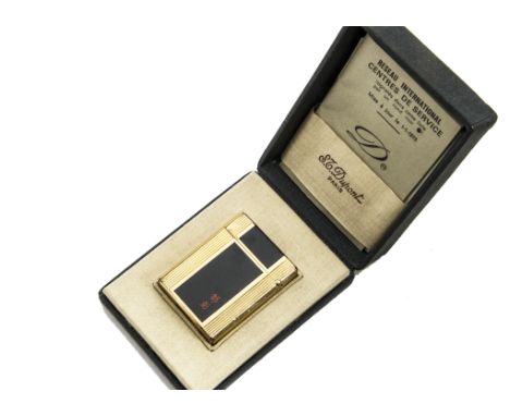 A 1970s S.J. Dupont gilt and black lacquer cigarette lighter, having two character Japanese mark, in box with papers (5) 