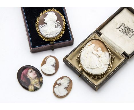 A 19th century carved shell cameo brooch, well carved with the bust of a lady and dove, in gold filigree surround, damaged to
