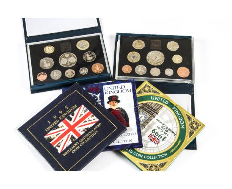 Four Royal Mint UK coin sets, together with three further UK sets, two crowns, a collection of First Day Covers and a sheet o