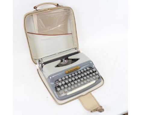 A Diplomat Retro portable typewriter 