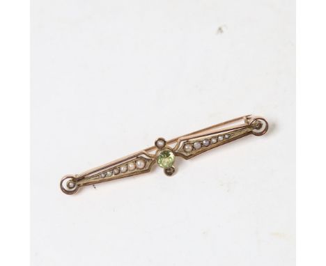 An early 20th century unmarked gold peridot and split-pearl brooch, length 5.5cm, 2.6g 