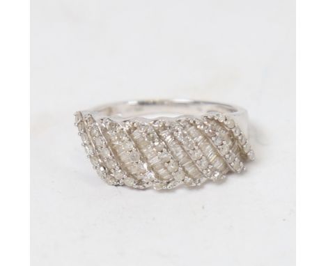 A modern 9ct white gold diamond cluster half hoop ring, hallmarks Birmingham 2013, setting height 9.1mm, size P, 4.1g 