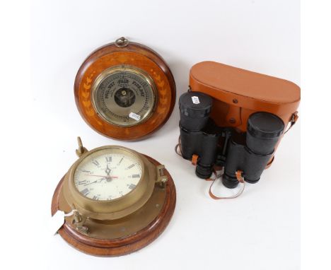 A pair of Zenith 10x50 field binoculars, a marquetry inlaid wall barometer, and a ship's bulkhead style clock (3) 