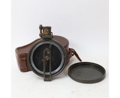A Stanley of London prismatic surveying compass, with folding sights and 2 colour filters, in original leather carrying case 