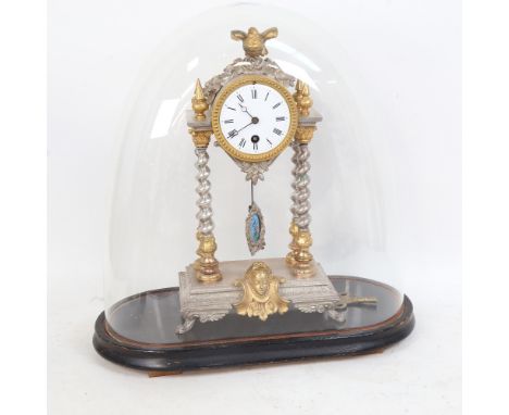 A Vintage silvered and gilded 4 pillar mantel clock, with pendulum and key, under glass dome with ebonised base, overall heig