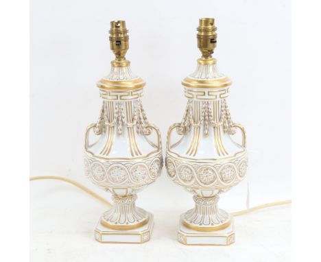 A pair of Dresden gilded white porcelain urn table lamps, height excluding fitting 13cm 