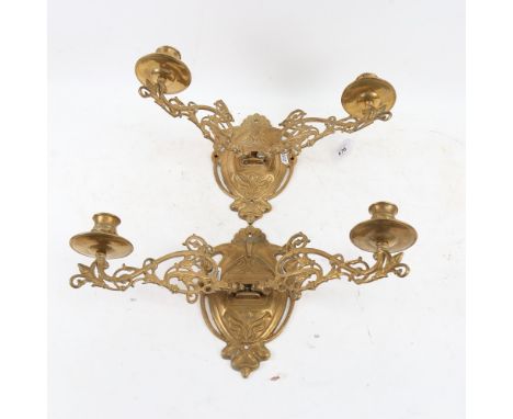 A pair of brass twin-branch wall light sconces, branch length 24cm 