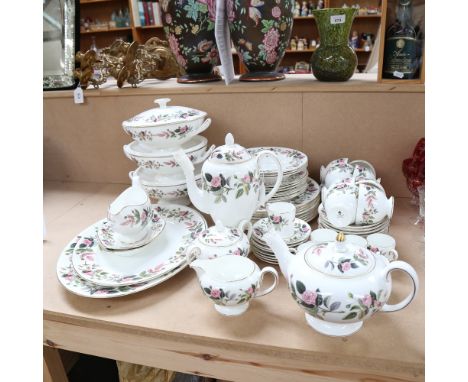 An extensive Wedgwood Hathaway Rose pattern tea and dinner service, including salad plates, tureens, teapot, dinner plates et