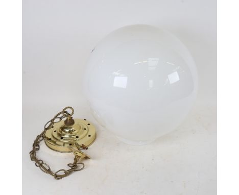 A large opaque milk glass and brass ceiling light fitting, shade diameter approx 35cm 
