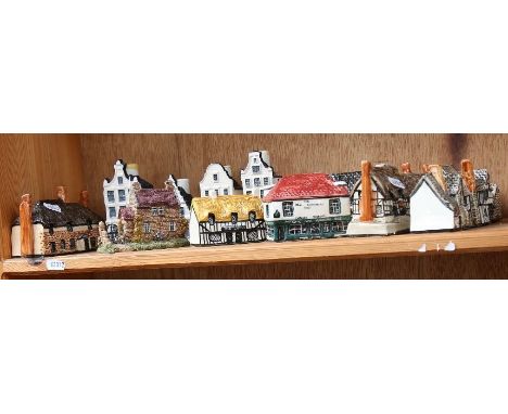 A group of ceramic model houses, including Leonardo Collection, and Delft 