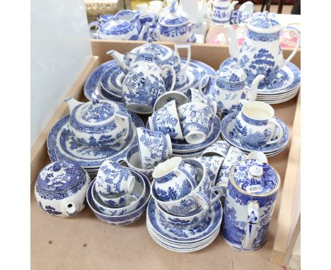 A large quantity of Wedgwood Willow pattern tea and dinnerware, including teapot, meat plates, teacups and saucers etc 