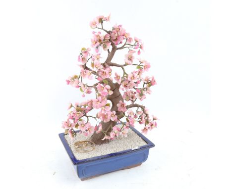 A large scale macket tree in jardiniere, with pink glass petals, height 46cm 