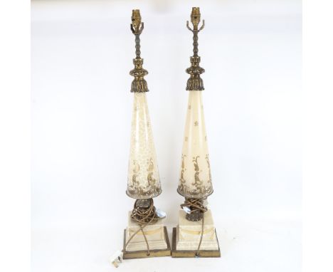 A large pair of painted and gilded ceramic tapered table lamps, height excluding fitting 77cm 