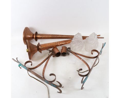 A pair of wall-mounted copper and frosted glass flaming torch light fittings, with wall brackets, copper body length 64cm 