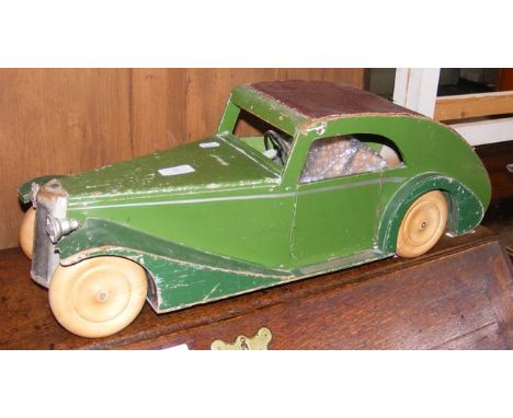 An old wooden model car - 62cms long