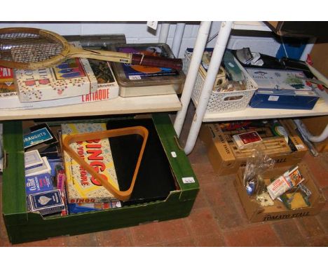 Four shelves of vintage toys, including model vehicles 