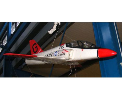 A motorized model aircraft, together with Turnigy remote control 