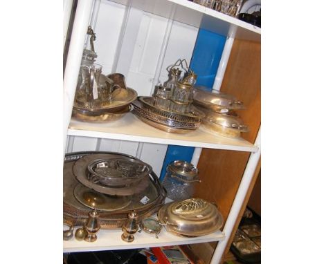 Two shelves of silver plate 