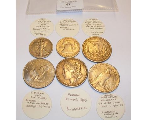 Four silver dollars and two silver half dollar US coins (various Presidents) CONDITION REPORT Our team are on hand to help an