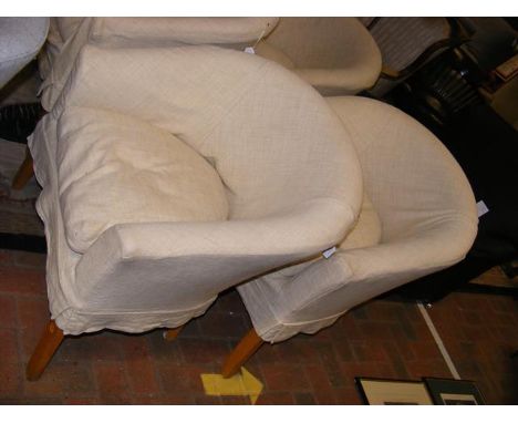 A pair of contemporary tub chairs with seat and cushion covers and spares