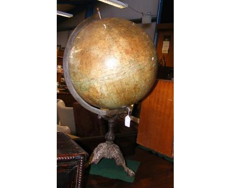 An old Phillips New Physical Terrestrial globe on cast metal stand - 64cms high