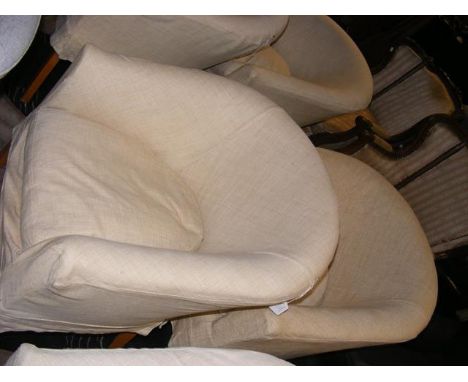 A pair of contemporary tub chairs with seat and cushion covers and spares