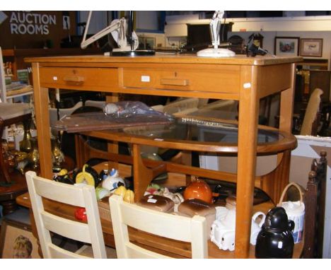 A light wood console table with two drawers - length 124cms