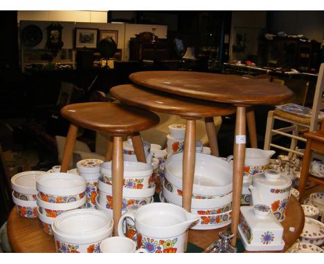 A nest of three Ercol 'Pebble' occasional tables 