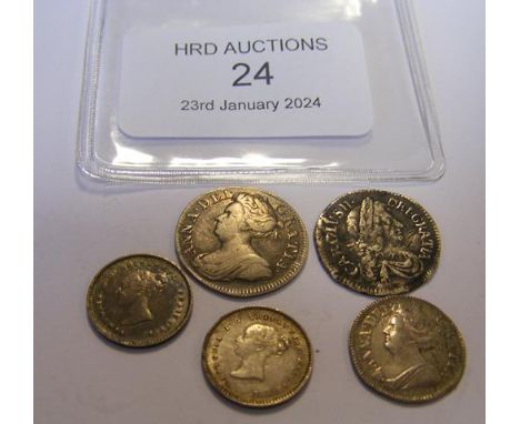 A Charles II silver four pence Maundy coin, 1679 together with a Queen Anne silver threepence Maundy coin, 1710 and three oth