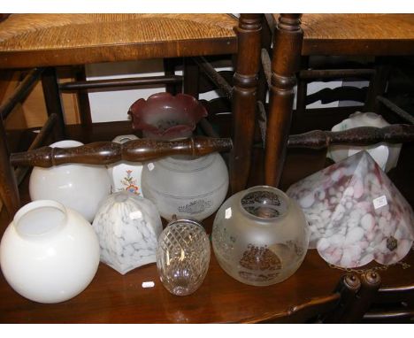 A collection of glass light shades 