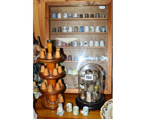 A COLLECTION OF TREEN, CERAMIC AND METAL THIMBLES, all in three display cases, together with a Royal Copenhagen mermaid figur