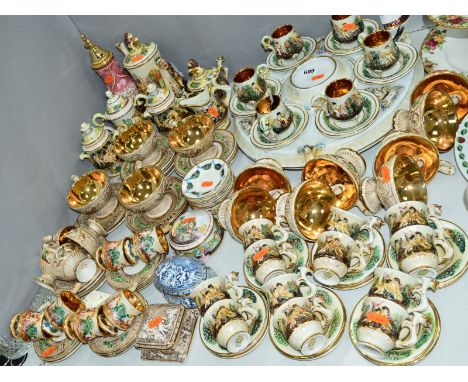 A COOLECTION OF CAPODIMONTE TEA AND COFFEE WARES, trinket boxes, most pieces moulded in relief with cherubs