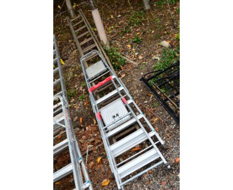 A WOODEN DOUBLE EXTENSION LADDER, and two Ali step ladders (3) 