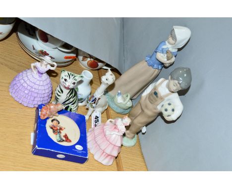 A SMALL GROUP OF ORNAMENTS, to include two Nao figures, boy with football and girl with dog, two Coalport minuettes 'Michelle