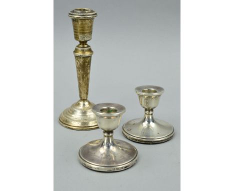 A PAIR OF ELIZABETH II DWARF SILVER CANDLESTICKS, Birmingham 1974, height 6.5cm, together with a Mappin & Webb candlestick, B