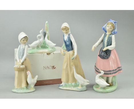 A LLADRO FIGURE, girl feeding duck, together with three Nao figures, to include boxed Duck group, girl feeding duck and girl 