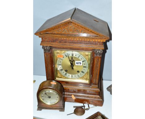 A LATE VICTORIAN OAK CASED BRACKET CLOCK, of architectural form, brass and silvered dial, Roman numerals, eight day movement 