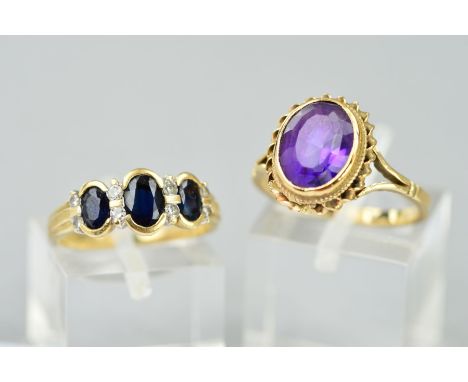 TWO 9CT GOLD DRESS RINGS, one single stone amethyst in a twist rope edge, amethyst measuring approximately 10mm x 8mm, ring s