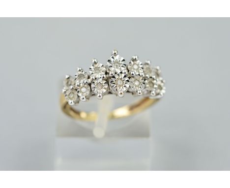 A MODERN 9CT GOLD DIAMOND DRESS RING, a graduated double half hoop design, ring size I, hallmarked 9ct gold, Sheffield, appro