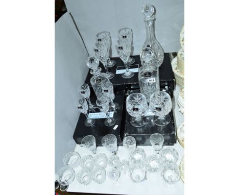 A QUANTITY OF BOXED ROYAL DOULTON DECANTER AND GLASS SETS, together with other loose glassware