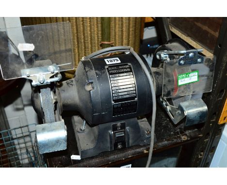 A BLACK AND DECKER PROFESSIONAL BENCH GRINDER