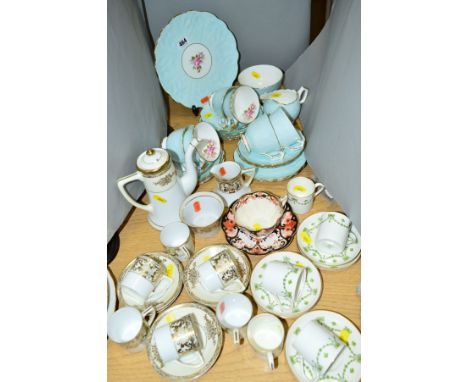 AYNSLEY CHINA TEASET PALE BLUE WITH ROSES, consisting of cake plate, milk jug, sugar bowl, six cups, six saucers and six side