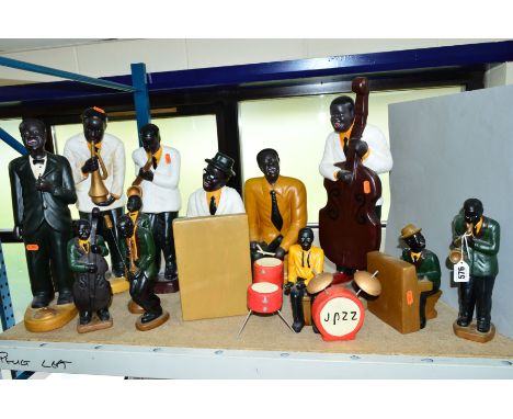 A GROUP OF CERAMIC FIGURES OF JAZZ MUSICIANS, some with drums, piano, etc (twelve + accessories)