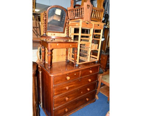 A VICTORIAN WALNUT CHEST, of two short and three long drawers with turned handles, on metal casters, approximate size width 1