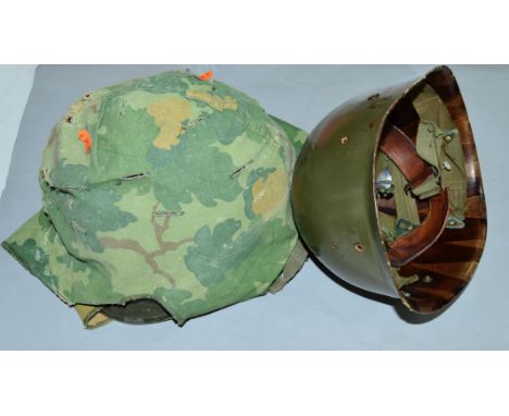 A BELGIUM MILITARY HELMET, possibly post WWII, all complete with plastic liner and camouflage cover, all buckles straps appea