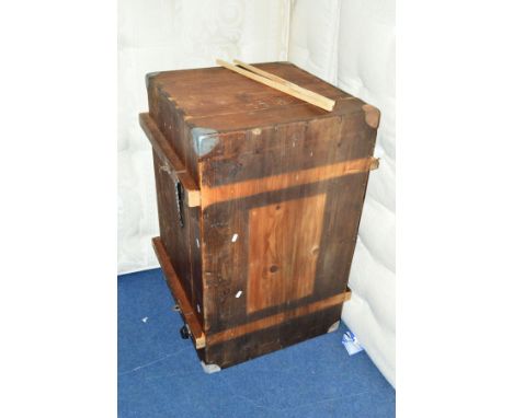 A STAINED PINE TRUNK